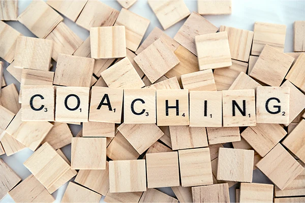 Image showing 'Scrabble' tiles spelling out "coaching"